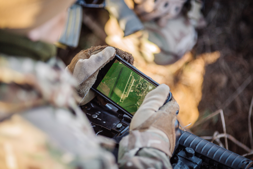soldiers holding gps